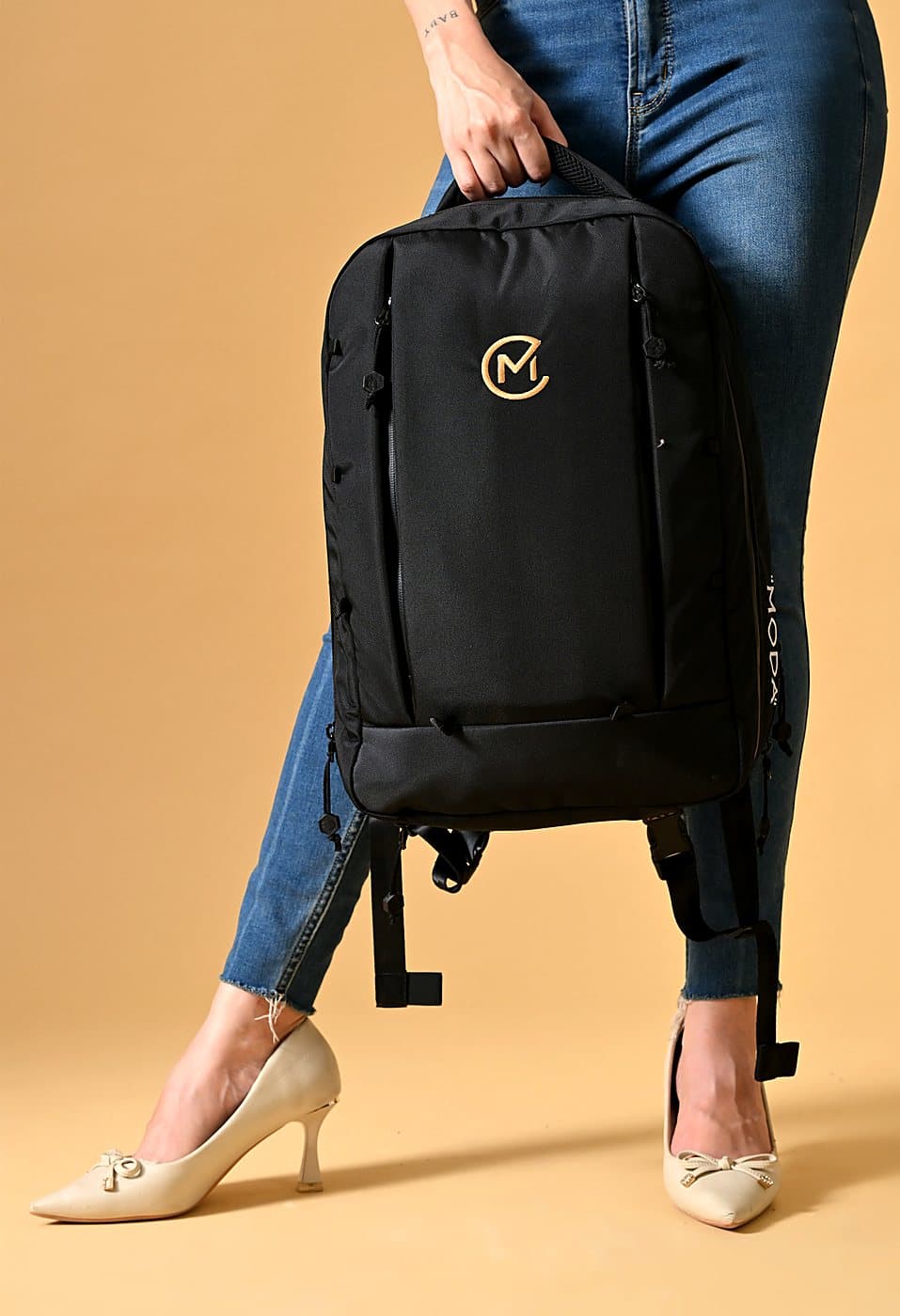 The Nexus One in Signet carried by its top handle