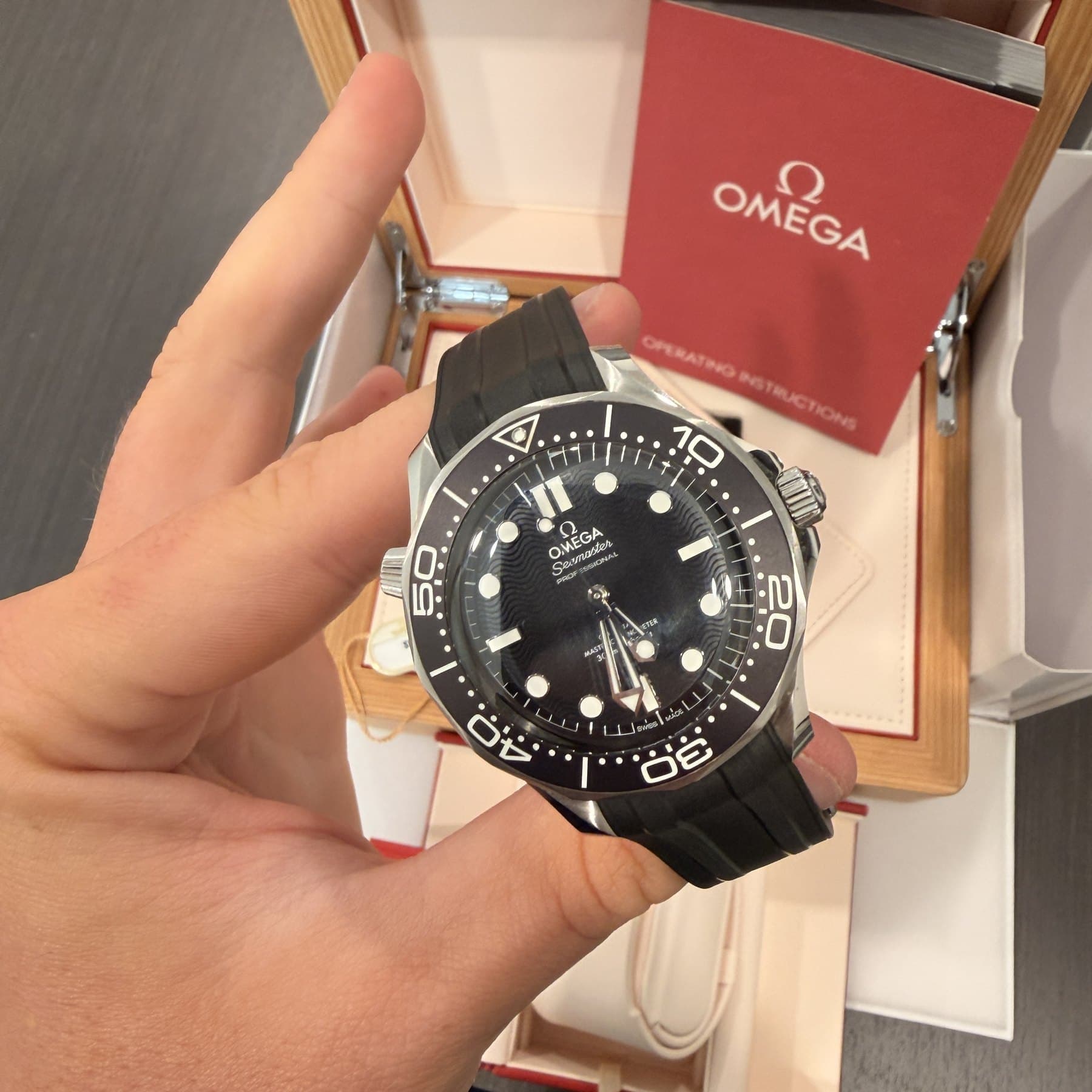 Omega Seamaster Diver 300M, black wave dial and ceramic bezel, on the hand