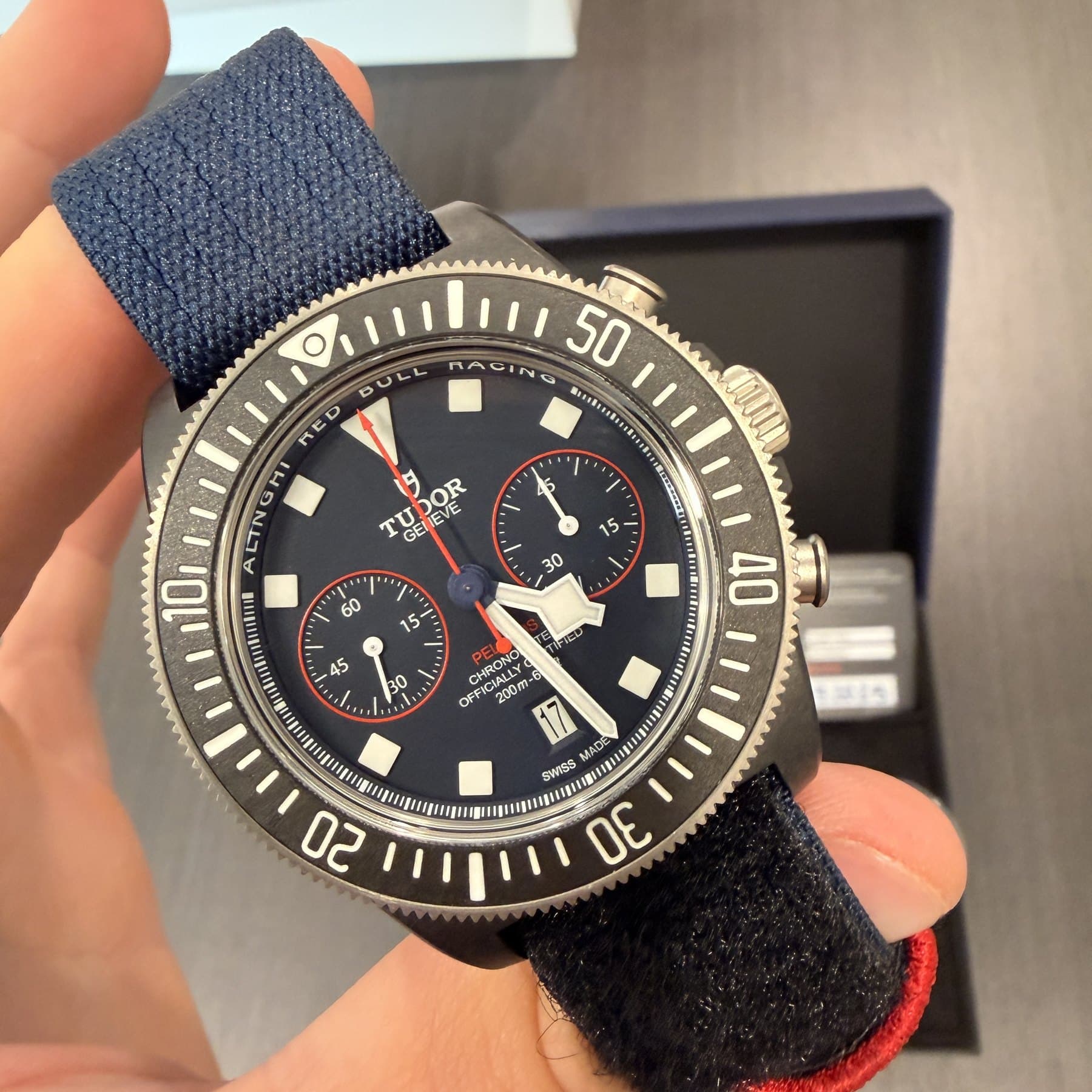 Tudor Pelagos FXD Chrono Alinghi Red Bull Racing, blue dial with red accents, close up