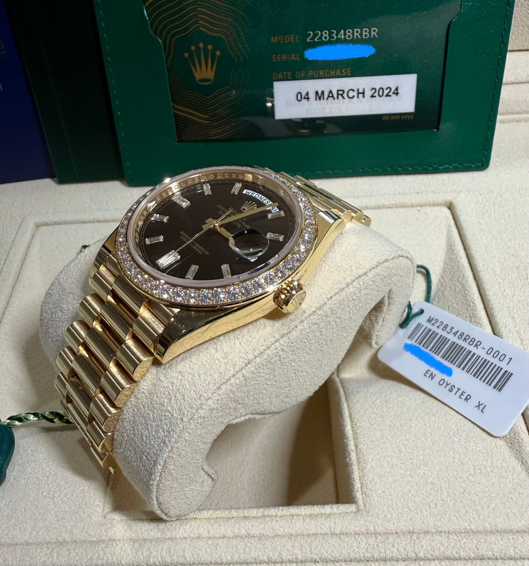 Rolex Day-Date 40, yellow gold diamond bezel 228348RBR